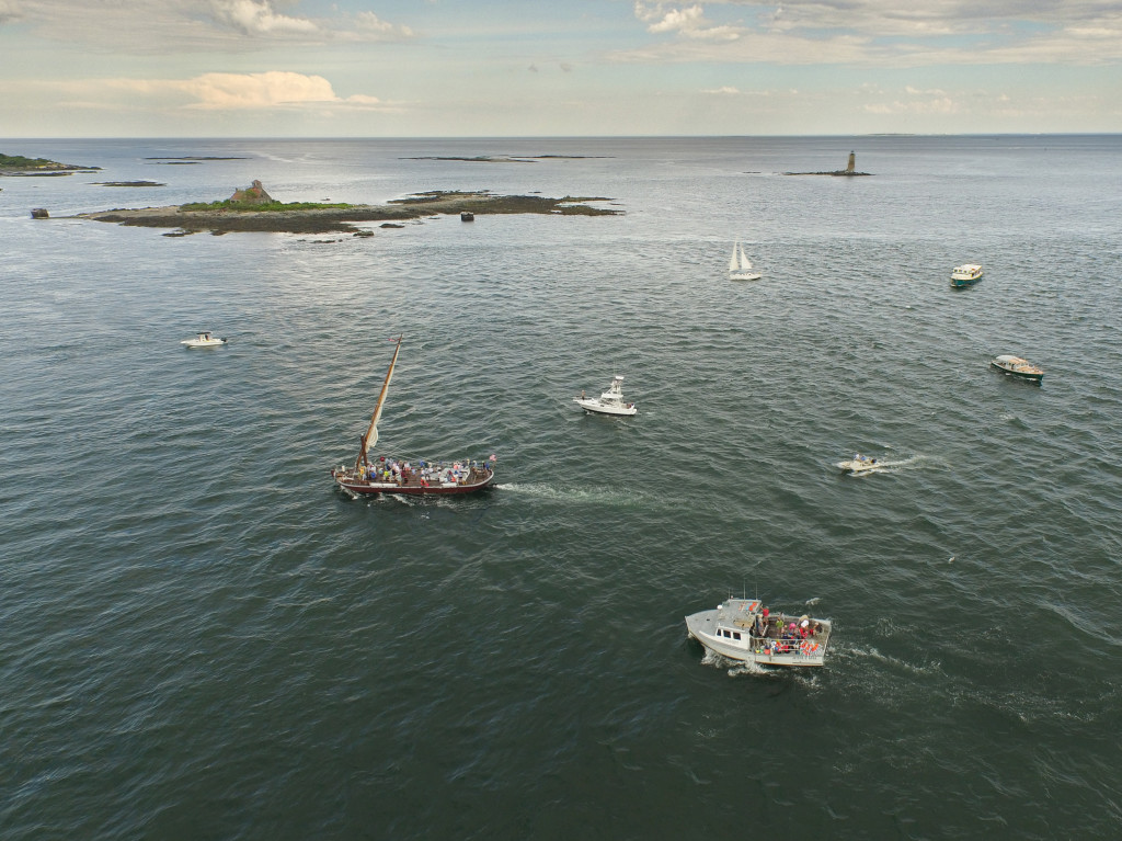 The Piscataqua gundalow participate in a flotilla to help raise funds to rehabilitate the old Wood Island Life Saving Station in the mouth of the Piscataqua river, off Kittery Point, ME and New Castle, NH